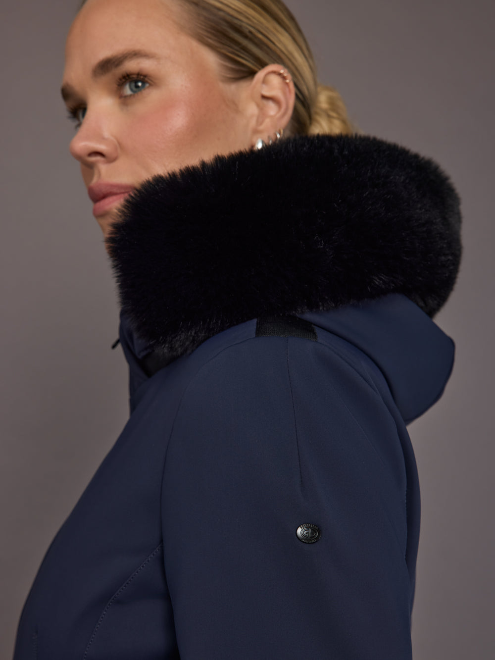Close-up of faux-fur hood and shoulder detail.