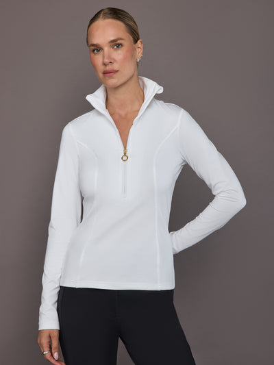Model wearing white half-zip ski pully, front view.