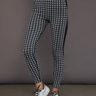 Seamless black white star baselayer tight on model, front view.