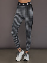 Seamless black white star baselayer tight on model, front view.