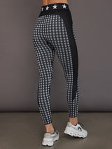 Seamless black white star baselayer tight on model, back view.