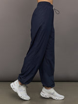 Model wears a pair of Navy joggers.