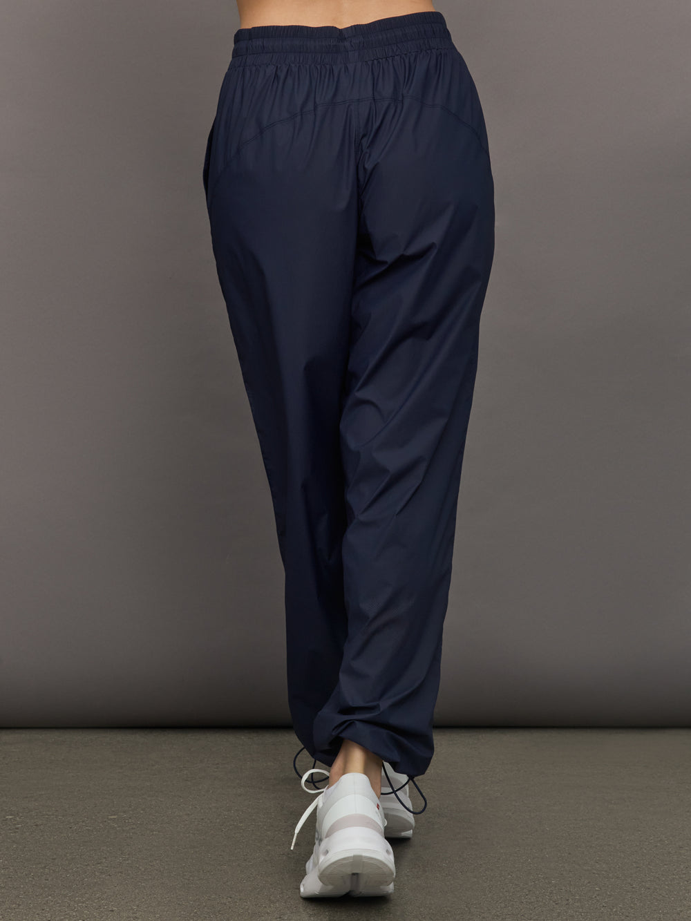 Model wears a pair of Navy joggers.