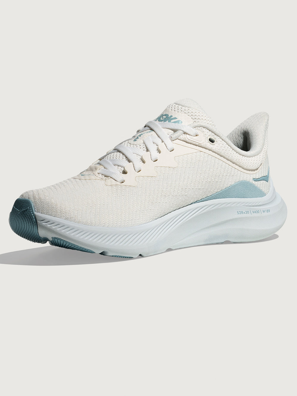 White HOKA running shoe with blue logo and accents on a white background