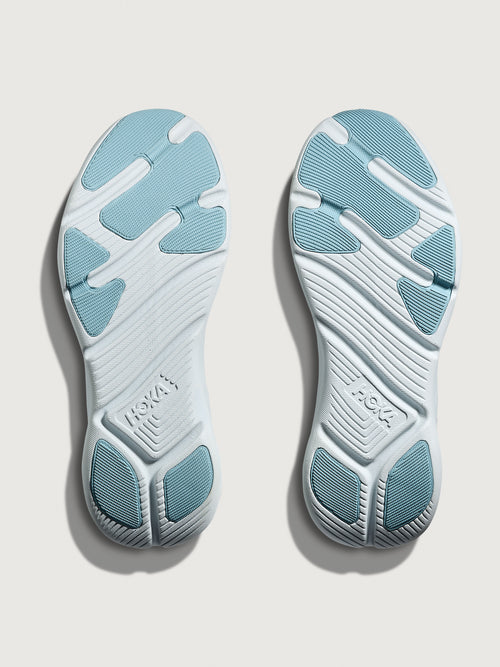 White HOKA running shoe with blue logo and accents on a white background