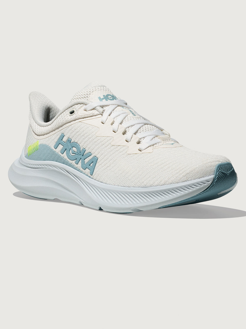 White HOKA running shoe with blue logo and accents on a white background