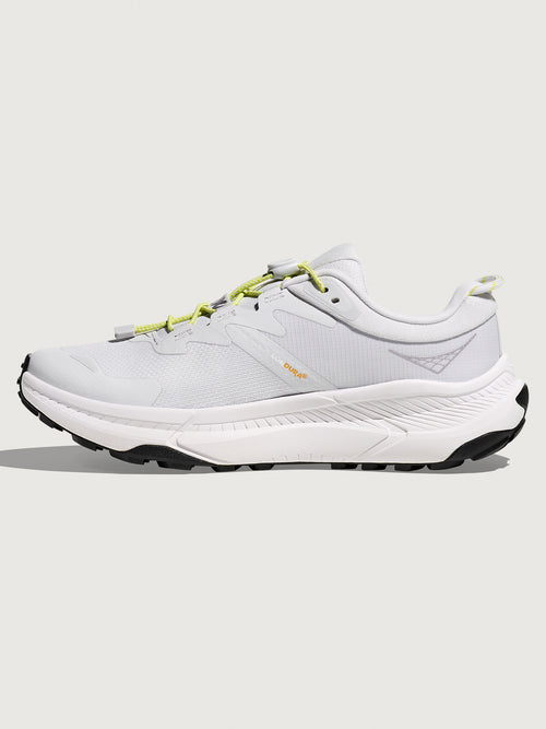 Grey/silver Hoka running shoe.