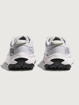 Grey/silver Hoka running shoe.