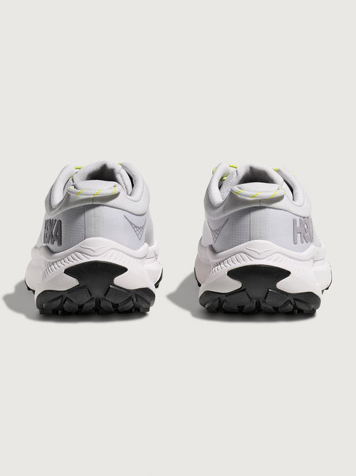 Grey/silver Hoka running shoe.