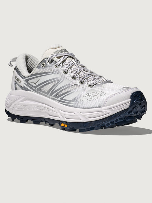 White and gray athletic shoe on a white background