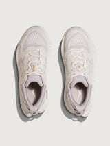 Pair of light gray sneakers with brand logo on a white background