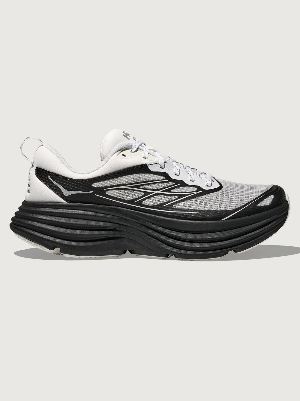 Black and white running shoe on a light gray background