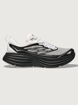 Black and white running shoe on a light gray background