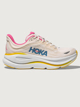 Bondi 9 Max Cushion Running Shoe in Alabaster/Birch, side view highlighting cushioned midsole and logo detail.