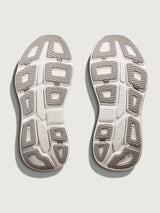 White/grey running shoe with 'Hoka' branding.