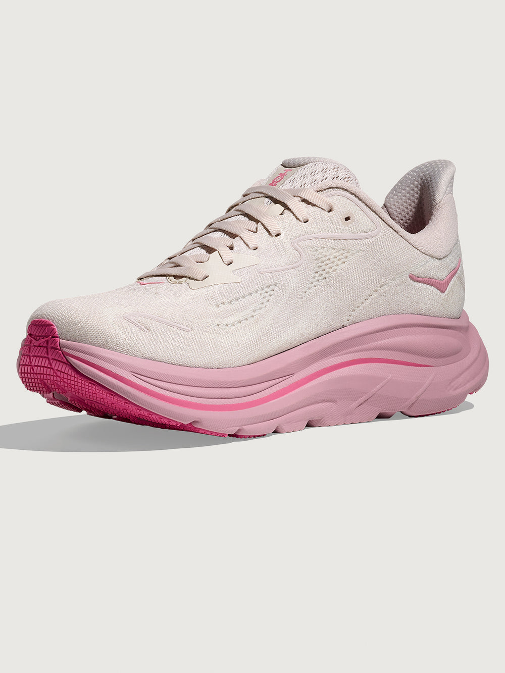 Pink Hoka running shoe with chunky sole.