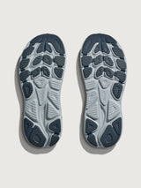 Clifton 10 Max Cushion Running Shoe in Grout/Mineral Blue, outsole view showing traction pattern and rubber coverage.