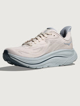 Clifton 10 Max Cushion Running Shoe in Grout/Mineral Blue, angled side view highlighting rocker sole and outsole grip.