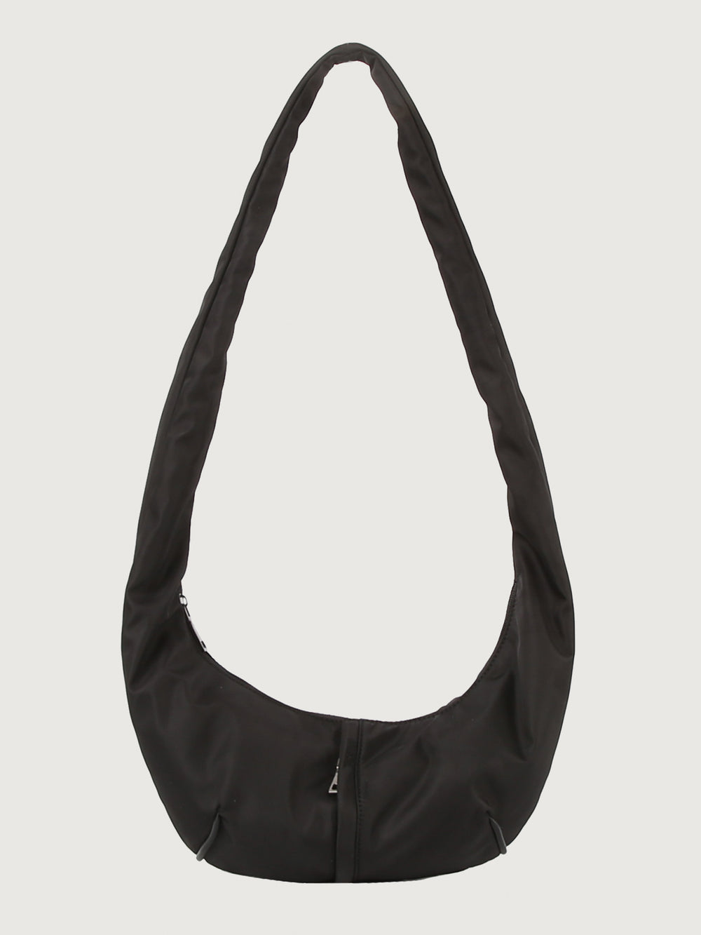 Black shoulder bag on a light gray background