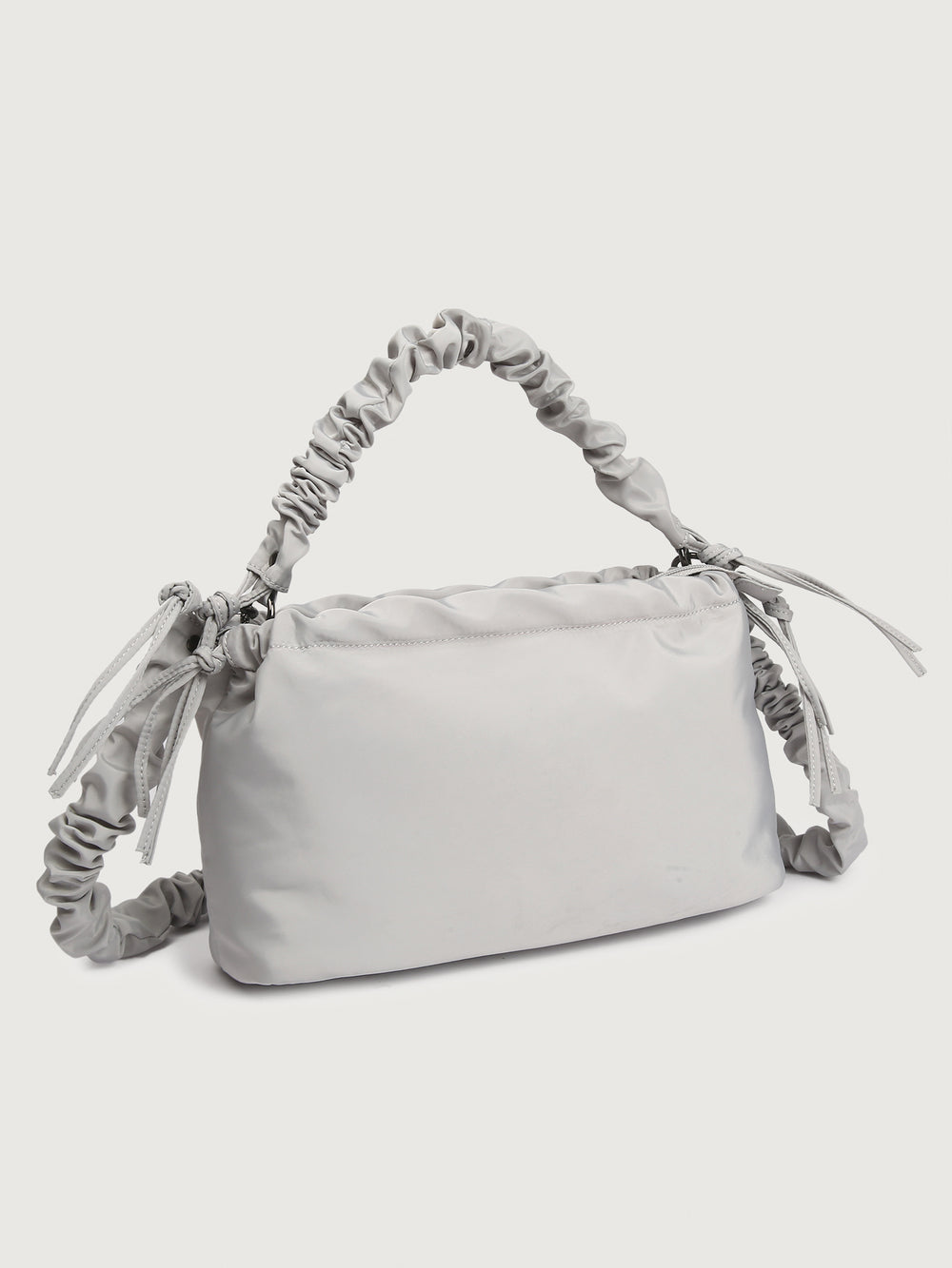 Gray handbag with ruched handle on a light gray background