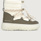 White and brown winter boot with Inuikii branding on a light gray background