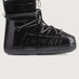 Black Inuikii boot on a light gray background