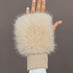 Close-up of beige faux fox knit mitten with ribbed cuff, front view.