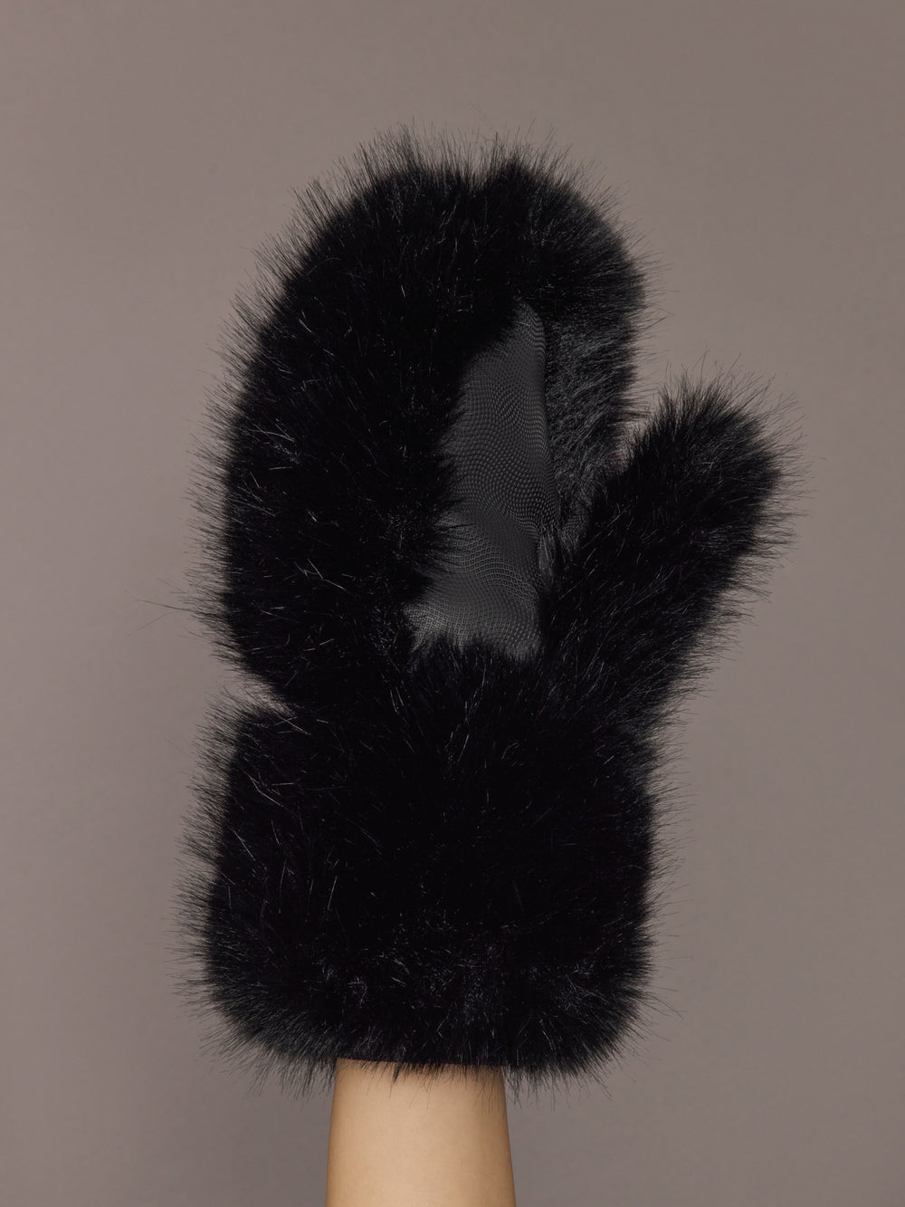 Back view of black faux fur mittens showing palm detail.