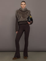 Model is wearing the Faux Fur Pullover Vest with Side Ties Mocha, full body view.