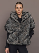 Model is wearing Faux Fox Hooded Chevron Short Sleeve Jacket in grey, front view.