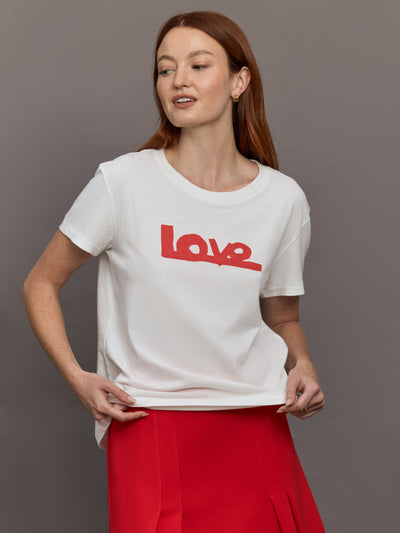 Model wears white short-sleeve t-shirt with a red 'Love' design on the front.