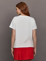 Model wears white short-sleeve t-shirt with a red 'Love' design on the front.