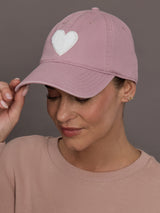 Model is wearing KR Imperfect Chenille Heart Hat in mauve, front view.