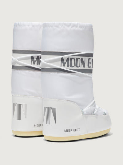 White moon boots with 'Moon Boot' branding on a light gray background