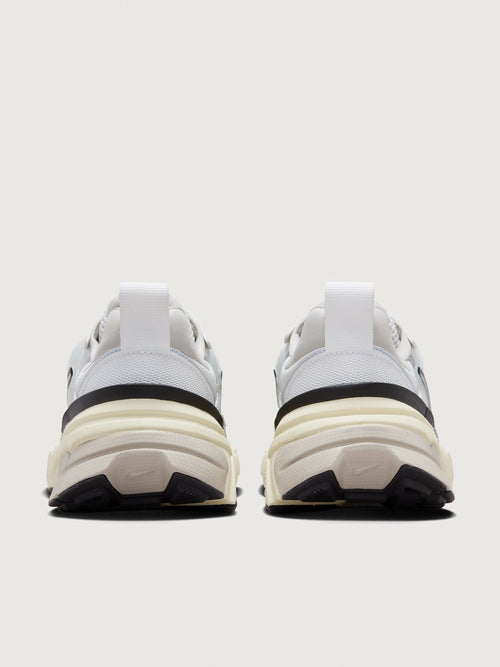 Gray and black sneaker with Nike logo on a white background