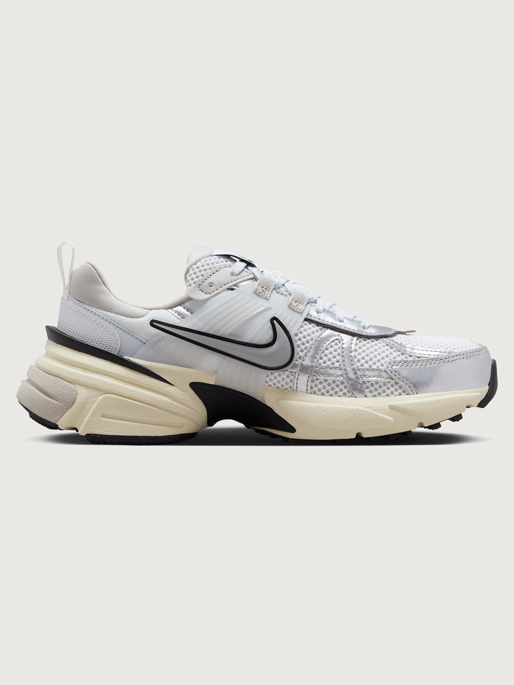 Gray and black sneaker with Nike logo on a white background