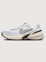 Gray and black sneaker with Nike logo on a white background