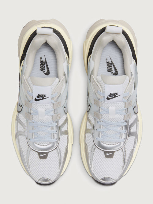 Gray and black sneaker with Nike logo on a white background