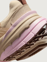 Nike V2K Run in Sanddrift and Pink Foam, midsole and outsole detail.