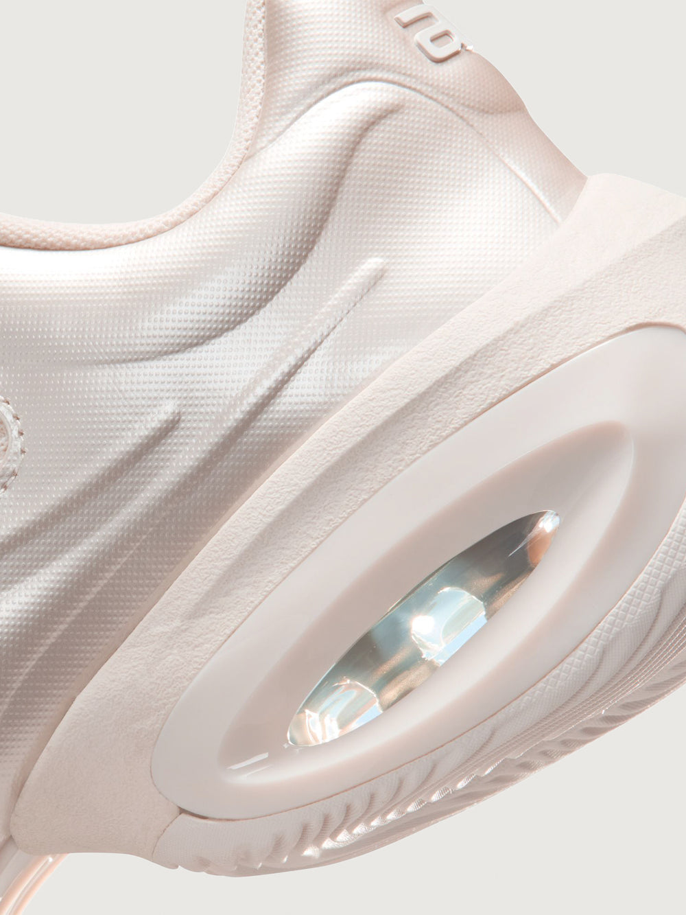 Air Max Muse in Chalk/Metallic Silver, close-up view of heel cushioning and air unit.