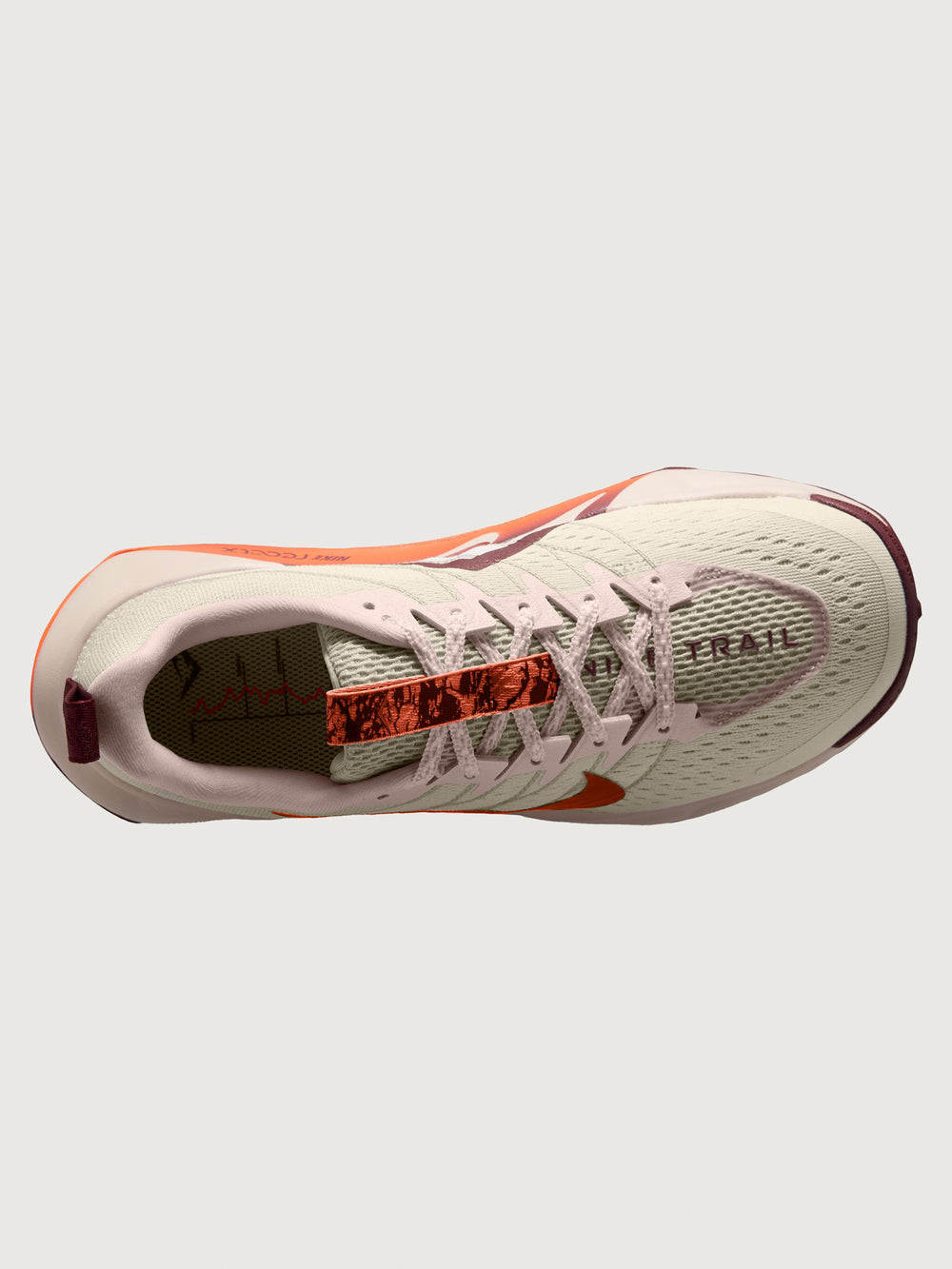 White running shoe with orange swoosh logo on a light gray background
