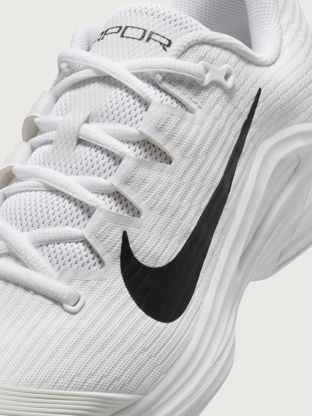 White athletic shoe with black swoosh logo on a white background