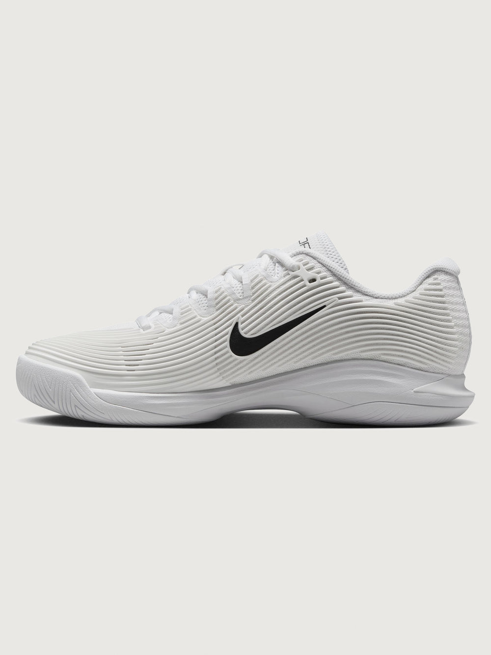 White athletic shoe with black swoosh logo on a white background