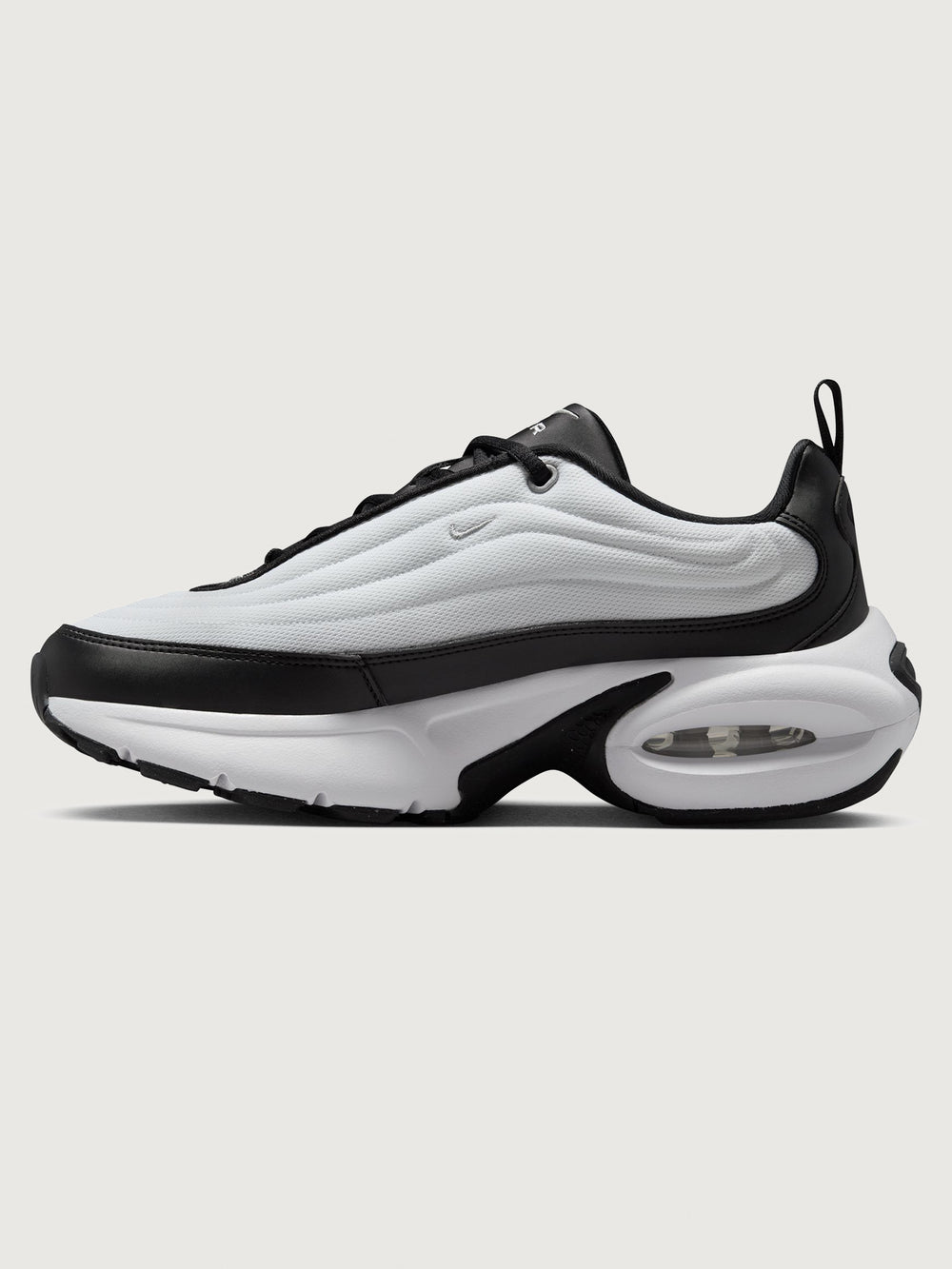 Black and white sneaker on a light gray background