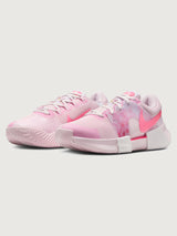 Pair of Nike GP Challenge 1 Naomi Osaka tennis shoes in pink, angled front view.