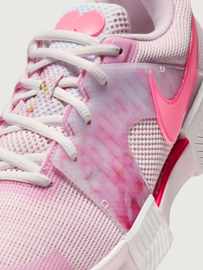 Close-up of Nike GP Challenge 1 Naomi Osaka sneaker showing mesh upper and floral overlay detail.