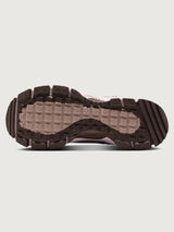 Nike Zoom Vomero Roam in Tattoo and Particle Rose, outsole view.