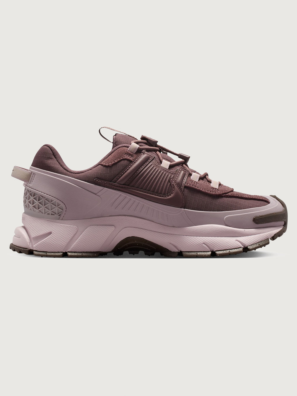 Nike Zoom Vomero Roam in Tattoo and Particle Rose, side view with mudguard detail.