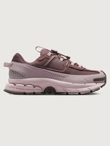 Nike Zoom Vomero Roam in Tattoo and Particle Rose, side profile view.