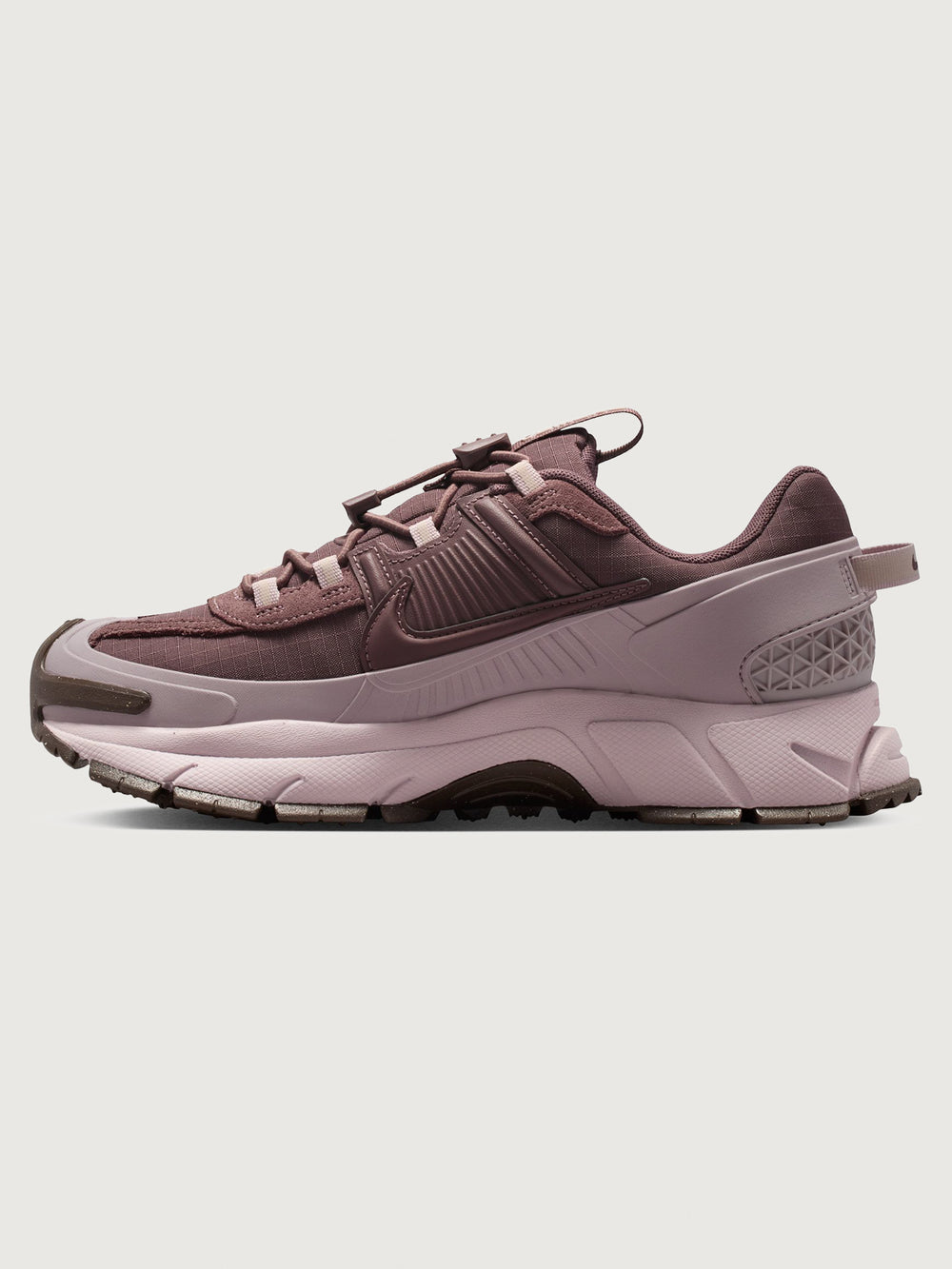 Nike Zoom Vomero Roam in Tattoo and Particle Rose, lateral side view.